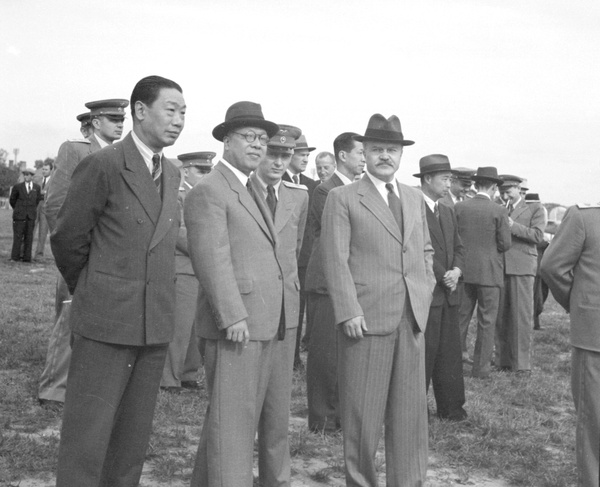 Hu Shize, Fu Bingchang and Vyacheslav Molotov, at an airfield, Moscow, for T.V. Soong's visit