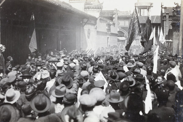 Workers' militia marching outside Huzhou Guild, Zhabei, Shanghai, 27 March 1927