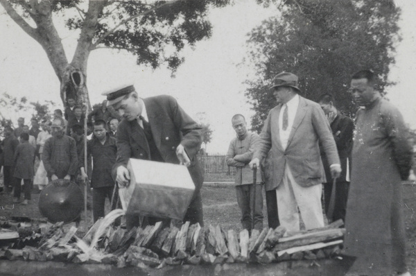 Customs men burning opium at Nanning in 1920