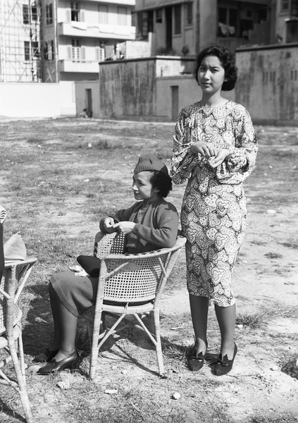 Lucy and Bea Hutchinson, in a yard near the Prince Edward Road apartment, Kowloon, Hong Kong