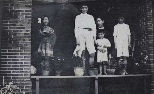 Maggie, Bill, Fred, Tom and Harry Hutchinson on the verandah, 35 Tongshan Road, Hongkou, Shanghai