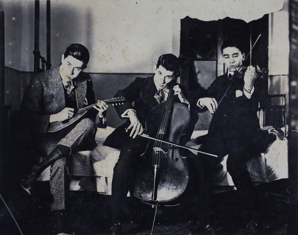 John Henderson, Bill Hutchinson, and another young man, with stringed musical instruments, 35 Tongshan Road, Hongkou, Shanghai
