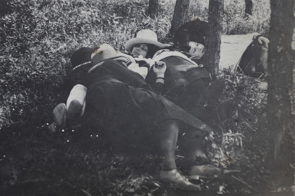 Maggie Hutchinson and Mabel Parker napping with other friends in a wooded area near Kunshan, April 1922 