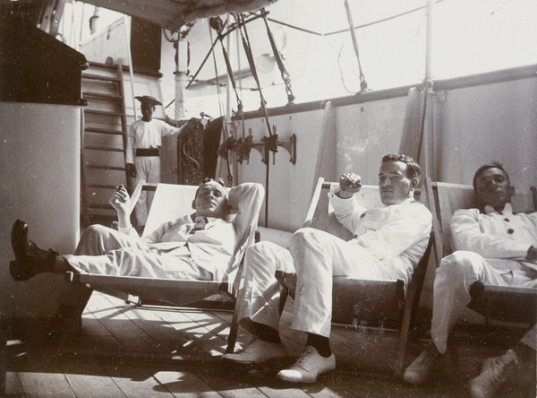 Men in deck chairs aboard Revenue Cruiser 'Likin'