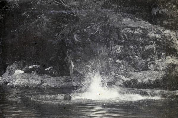 Captain Milne, of H.M.S. Plover, swimming, near Kiukiang