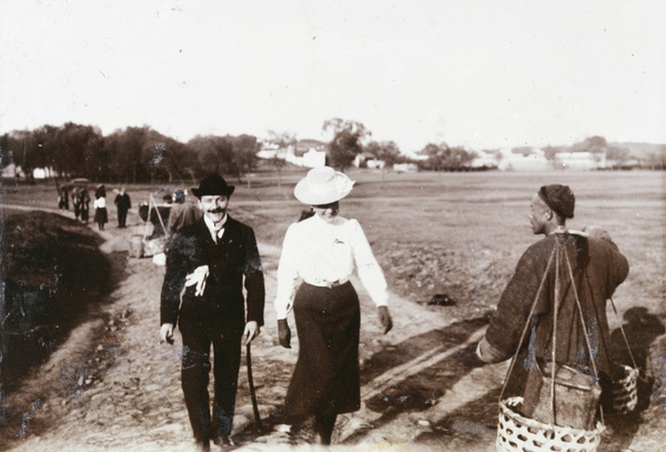 Pierre Bovinais with Gladys Hughes, and a pedlar