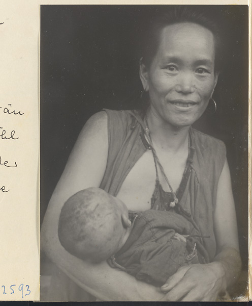 Woman nursing a child in the Lost Tribe country