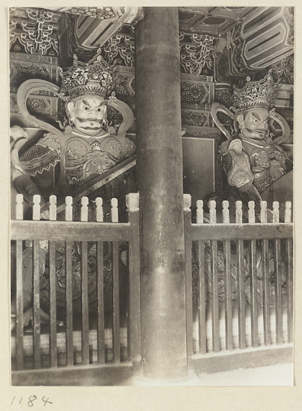 Two celestial kings, one with a sword, at Pu luo si