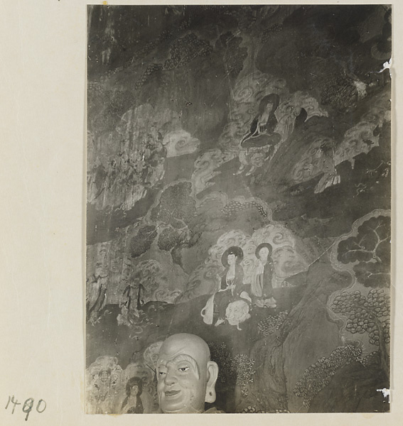 Mural detail and head of a Luohan at Qian men temple or Guan di miao