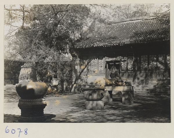 Facade detail of Da zhong si and courtyard with metal vats and ru yi-shaped stone chime