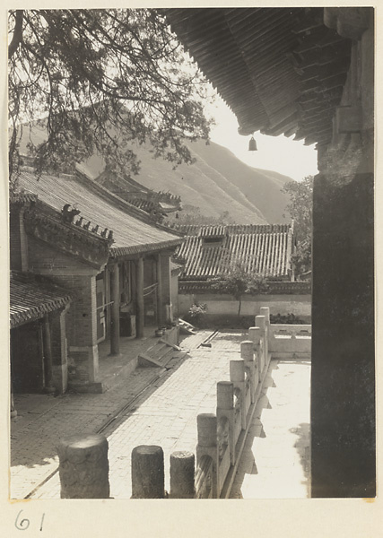Details of temple buildings at Tan zhe si showing facade of one and terrace of another