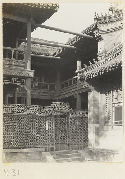 Building details showing roof ornaments, balconies, and latticework at Bai yun guan