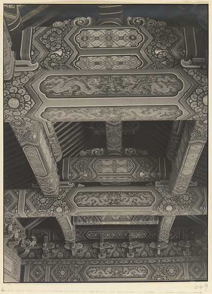 Interior view of Qi nian men showing roof beam construction and painted decoration
