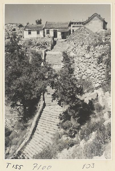 Trail up Tai Mountain with buildings and stone steps