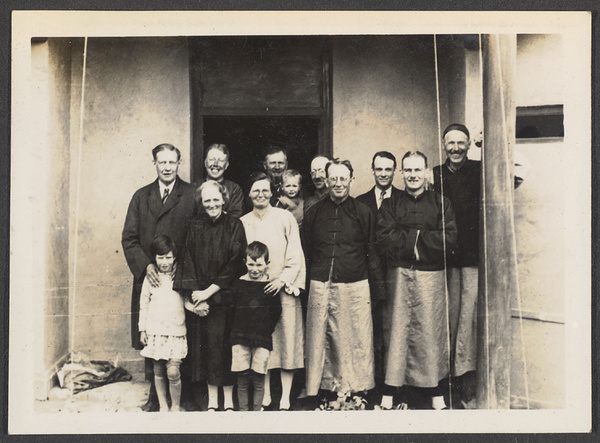 Tsinghai missionary group.  L. to R.  Dr. Z., Miss Learner, Mrs. Learner, Street, Mrs. Harris & son, Mr. Plymire, Mr. Harris & son, Mr. Mann, Mr. Wood, Mr. Knight, Mr. Learner.