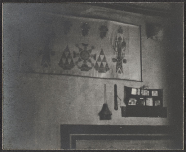 Tsingshui Ho Valley.  North to the Yellow River.  An Ahung's room.  Rosary, cap, Ali's sword.