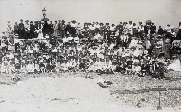 A missionary gathering on a beach in England