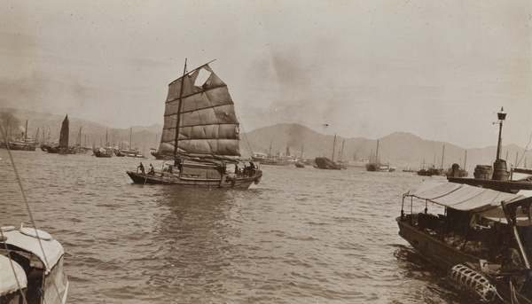 A cargo junk with a torn sail, Hong Kong