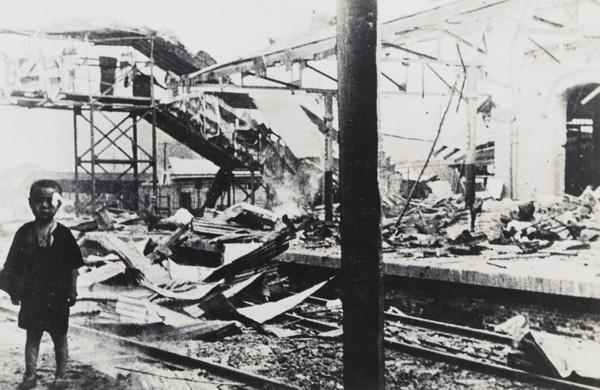 A bandaged boy on a platform at Shanghai South Railway Station, after the bombing on 28 August 1937