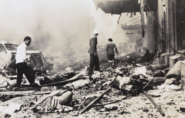 Casualties and debris outside the Cathay Hotel, Shanghai, after the bombing on 14 August 1937