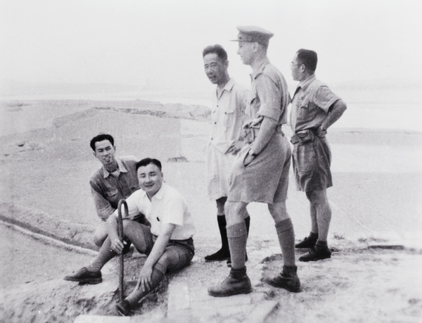 John E. Stanfield with Chinese military intelligence officers, by Yellow River