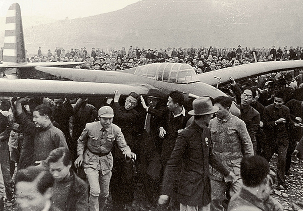 Louis de San's glider and crowd, after Asian record-setting glider flight at Chungking