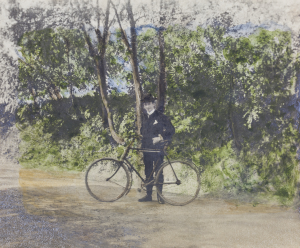 George Woodhead with bicycle on Zekawei Road, Shanghai
