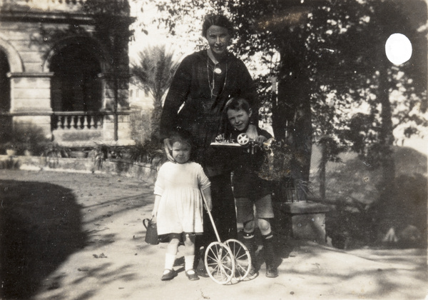 Dr Eleanor Whitworth Mitchell and her children, Florence Alison and Harold, with toys, Hong Kong