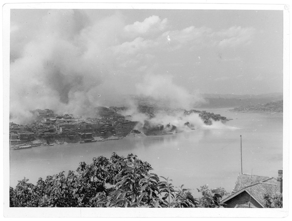 Steam and fumes rising from the Yangtze River due to incendiary bombs, Chongqing