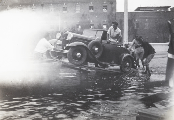Rescuing  a car from flood waters, Tianjin, September 1938
