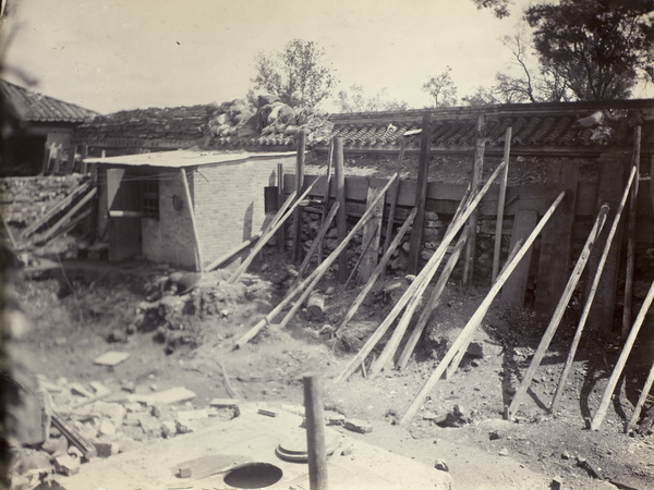 Reinforced outer wall, and water well, during siege of the Legation Quarter, Peking