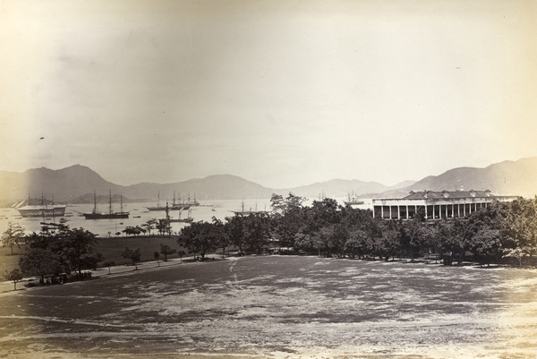 View of ships in the harbour and Murray House, Hong Kong