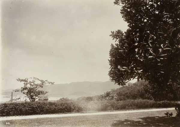 View of the harbour and landscape from possibly the grounds of Government House, Hong Kong