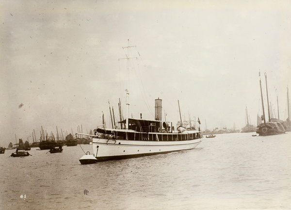 A steamboat and junks in the background, Hong Kong