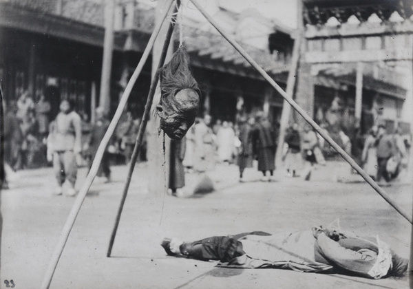 Exposure of severed head of rioter, Peking Mutiny, 1912