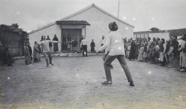 Ball game, with spectators