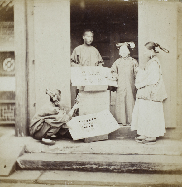 Manchu women buying flowers as ornaments for their headdress (qitou), Beijing