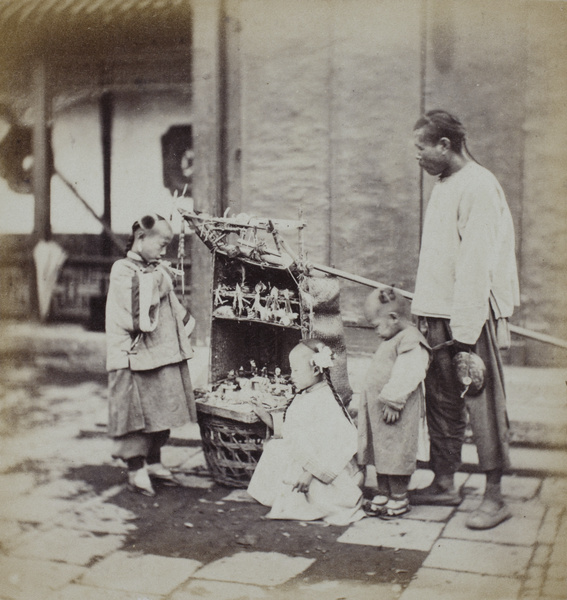 An itinerant toy seller, with three children, Beijing