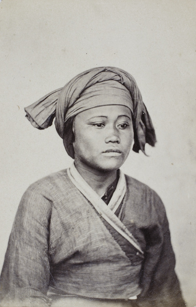 Gochi, a twenty-year old Pepohoan woman, wearing a headscarf, Baksa, Taiwan