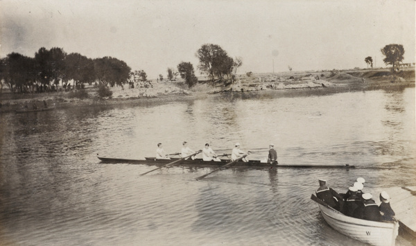 Rowing, with sailors watching