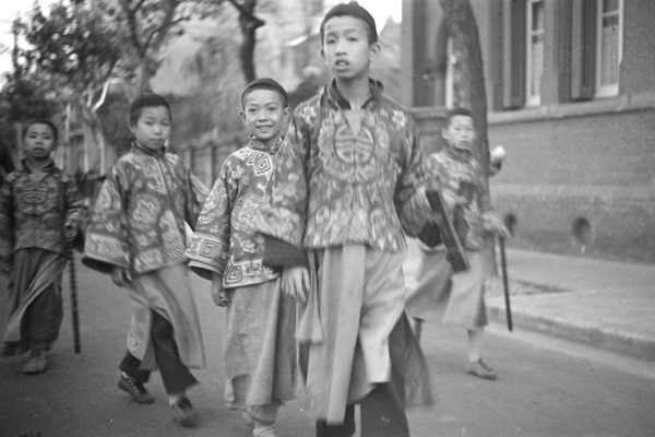 Chinese boys wearing festival jackets