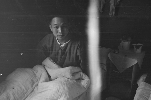 Patient in hospital bed, Shanghai