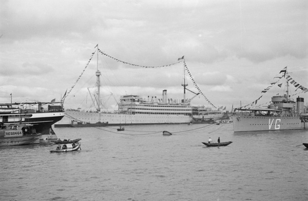 USS Henderson and other ships with pennants flying, Shanghai