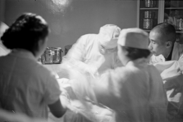 Medical team operating on a patient, Shanghai