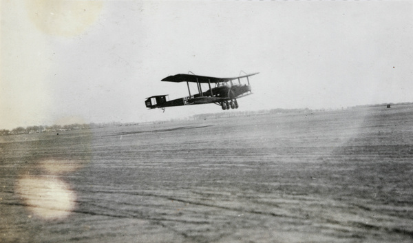 Handley Page biplane taking off