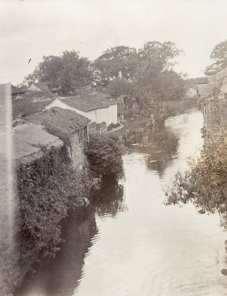 A creek photographed from a bridge