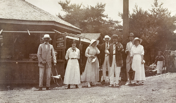 Lawn tennis party outside H. Ichinose, photographer's shop, c.1910