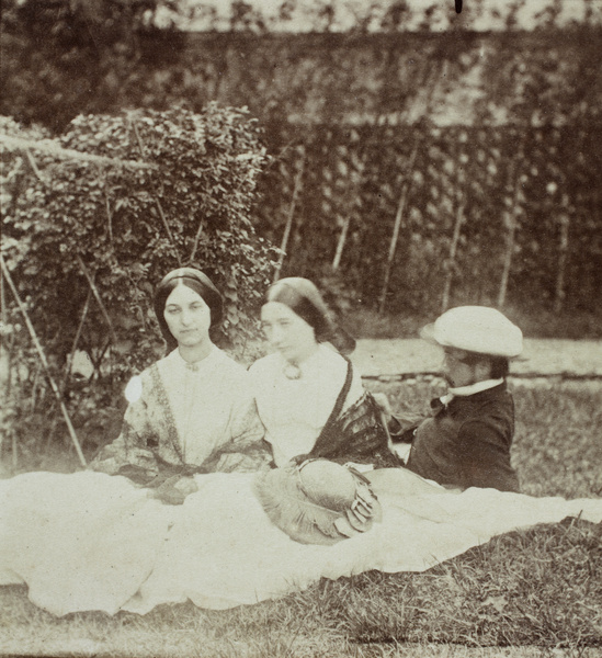 Mrs Warden, with an unidentified woman and Markham, in a garden, Shanghai