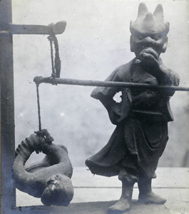 A grotesque clay figurine (torture)