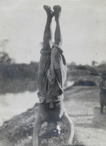 A man standing on his head